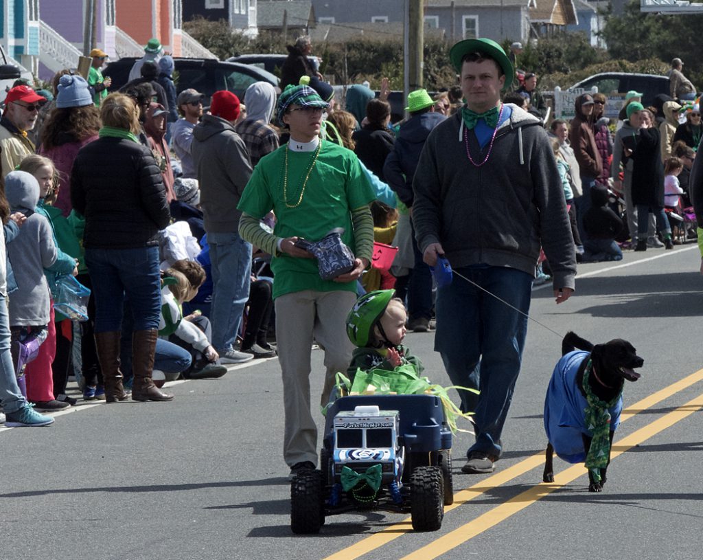 An RC truck tows it's passenger at the 30th Annual Kelly's St. Patrick's Day Parade.