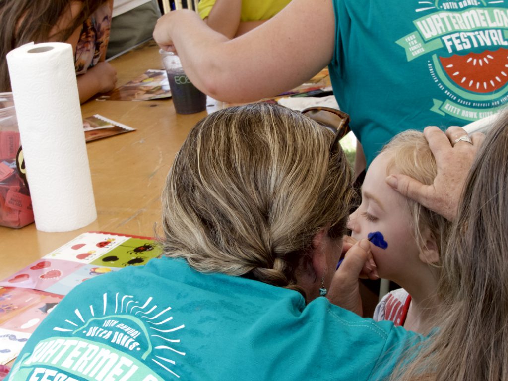 Face painting is just one of the great kid-friendly activities at the Kitty Hawk Kites Watermelon Festival.
