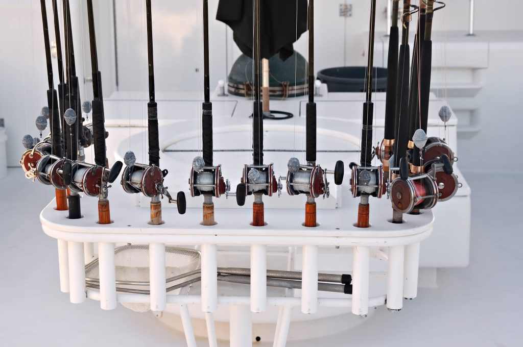 A rack of fishing rods on a charter boat