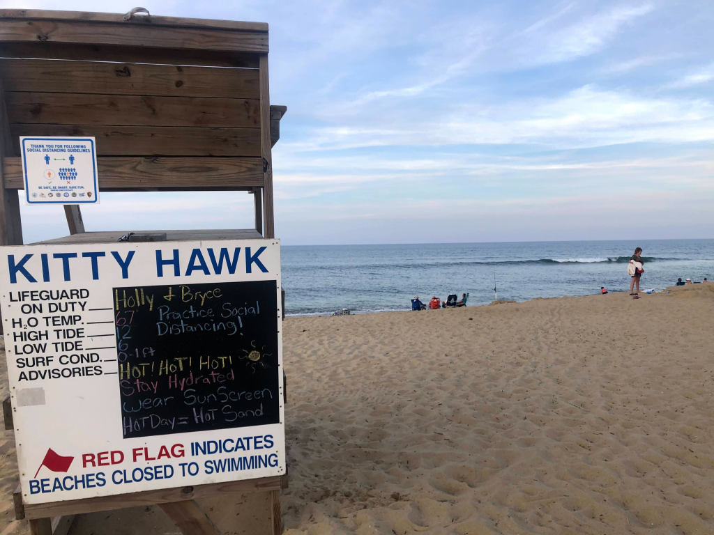Wooden lifeguard stand with condition warnings located in Kitty Hawk, NC